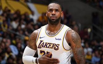 LOS ANGELES, CA - NOVEMBER 17: LeBron James #23 of the Los Angeles Lakers looks on during the game against the Atlanta Hawks on November 17, 2019 at STAPLES Center in Los Angeles, California. NOTE TO USER: User expressly acknowledges and agrees that, by downloading and/or using this Photograph, user is consenting to the terms and conditions of the Getty Images License Agreement. Mandatory Copyright Notice: Copyright 2019 NBAE (Photo by Andrew D. Bernstein/NBAE via Getty Images)