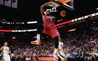MIAMI, FL - DECEMBER 16:  LeBron James #6 of the Miami Heat dunks the ball in the second quarter against the Utah Jazz at American Airlines Arena on December 16, 2013 in Miami, Florida. NOTE TO USER: User expressly acknowledges and agrees that, by downloading and or using this photograph, User is consenting to the terms and conditions of the Getty Images License Agreement.  (Photo by Christopher Trotman/Getty Images)
