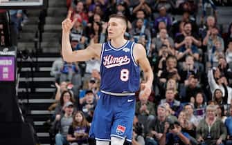 1183551883 SACRAMENTO, CA - NOVEMBER 19: Bogdan Bogdanovic #8 of the Sacramento Kings reacts to a play against the Phoenix Suns on November 19, 2019 at Golden 1 Center in Sacramento, California. NOTE TO USER: User expressly acknowledges and agrees that, by downloading and or using this Photograph, user is consenting to the terms and conditions of the Getty Images License Agreement. Mandatory Copyright Notice: Copyright 2019 NBAE (Photo by Rocky Widner/NBAE via Getty Images)