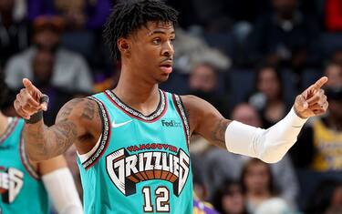 MEMPHIS, TN - NOVEMBER 23:  Ja Morant #12 of the Memphis Grizzlies reacts against the Los Angeles Lakers during a game on November 23, 2019 at FedEx Forum in Memphis, Tennessee.  NOTE TO USER: User expressly acknowledges and agrees that, by downloading and or using this photograph, User is consenting to the terms and conditions of the Getty Images License Agreement. Mandatory Copyright Notice: Copyright 2019 NBAE (Photo by Joe Murphy/NBAE via Getty Images)