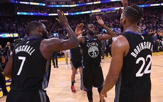 SAN FRANCISCO, CA - NOVEMBER 27: Draymond Green #23 of the Golden State Warriors high-fives his teammates after a game against the Chicago Bulls on November 27, 2019 at Chase Center in San Francisco, California. NOTE TO USER: User expressly acknowledges and agrees that, by downloading and or using this photograph, user is consenting to the terms and conditions of Getty Images License Agreement. Mandatory Copyright Notice: Copyright 2019 NBAE (Photo by Noah Graham/NBAE via Getty Images)