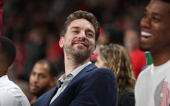 PORTLAND, OREGON - OCTOBER 08: Pau Gasol #16 of the Portland Trail Blazers smiles from the bench in the fourth quarter against the Denver Nuggets during a preseason game at Veterans Memorial Coliseum on October 08, 2019 in Portland, Oregon. NOTE TO USER: User expressly acknowledges and agrees that, by downloading and or using this photograph, User is consenting to the terms and conditions of the Getty Images License Agreement (Photo by Abbie Parr/Getty Images)