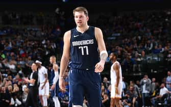 DALLAS, TX - NOVEMBER 20: Luka Doncic #77 of the Dallas Mavericks walks down the court during a game against the Golden State Warriors on November 20, 2019 at the American Airlines Center in Dallas, Texas. NOTE TO USER: User expressly acknowledges and agrees that, by downloading and or using this photograph, User is consenting to the terms and conditions of the Getty Images License Agreement. Mandatory Copyright Notice: Copyright 2019 NBAE (Photo by Glenn James/NBAE via Getty Images)