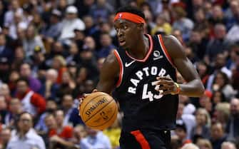 TORONTO, ON - NOVEMBER 20:  Pascal Siakam #43 of the Toronto Raptors dribbles the ball during the second half of an NBA game against the Orlando Magic at Scotiabank Arena on November 20, 2019 in Toronto, Canada.  NOTE TO USER: User expressly acknowledges and agrees that, by downloading and or using this photograph, User is consenting to the terms and conditions of the Getty Images License Agreement.  (Photo by Vaughn Ridley/Getty Images)