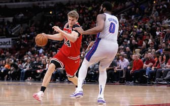 1189035311 CHICAGO, ILLINOIS - NOVEMBER 20: Lauri Markkanen #24 of the Chicago Bulls dribbles the ball while being guarded by Andre Drummond #0 of the Detroit Pistons in the fourth quarter at the United Center on November 20, 2019 in Chicago, Illinois. NOTE TO USER: User expressly acknowledges and agrees that, by downloading and or using this photograph, User is consenting to the terms and conditions of the Getty Images License Agreement. (Photo by Dylan Buell/Getty Images)