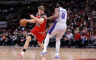 CHICAGO, ILLINOIS - NOVEMBER 20: Lauri Markkanen #24 of the Chicago Bulls dribbles the ball while being guarded by Andre Drummond #0 of the Detroit Pistons in the fourth quarter at the United Center on November 20, 2019 in Chicago, Illinois. NOTE TO USER: User expressly acknowledges and agrees that, by downloading and or using this photograph, User is consenting to the terms and conditions of the Getty Images License Agreement. (Photo by Dylan Buell/Getty Images)