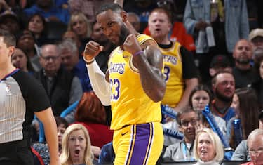 OKLAHOMA CITY, OK - NOVEMBER 22: LeBron James #23 of the Los Angeles Lakers flexes after a made basket during a game against the Oklahoma City Thunder on November 22, 2019 at Chesapeake Energy Arena in Oklahoma City, Oklahoma. NOTE TO USER: User expressly acknowledges and agrees that, by downloading and or using this photograph, User is consenting to the terms and conditions of the Getty Images License Agreement. Mandatory Copyright Notice: Copyright 2019 NBAE (Photo by Joe Murphy/NBAE via Getty Images)