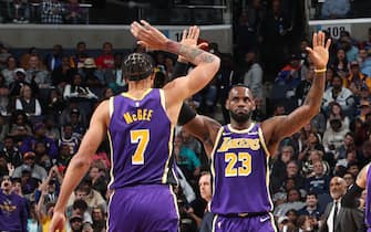 1184258012 MEMPHIS, TN - NOVEMBER 23: JaVale McGee #7 and LeBron James #23 of the Los Angeles Lakers hi-five during a game against the Memphis Grizzlies on November 23, 2019 at FedExForum in Memphis, Tennessee. NOTE TO USER: User expressly acknowledges and agrees that, by downloading and or using this photograph, User is consenting to the terms and conditions of the Getty Images License Agreement. Mandatory Copyright Notice: Copyright 2019 NBAE (Photo by Joe Murphy/NBAE via Getty Images)