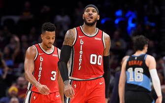 CLEVELAND, OHIO - NOVEMBER 23: CJ McCollum #3 and Carmelo Anthony #00 of the Portland Trail Blazers walk off the court during the second half against the Cleveland Cavaliers at Rocket Mortgage Fieldhouse on November 23, 2019 in Cleveland, Ohio. NOTE TO USER: User expressly acknowledges and agrees that, by downloading and/or using this photograph, user is consenting to the terms and conditions of the Getty Images License Agreement. (Photo by Jason Miller/Getty Images)