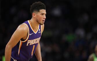 MINNEAPOLIS, MN -  NOVEMBER 23: Devin Booker #1 of the Phoenix Suns looks on against the Minnesota Timberwolves on November 23, 2019 at Target Center in Minneapolis, Minnesota. NOTE TO USER: User expressly acknowledges and agrees that, by downloading and or using this Photograph, user is consenting to the terms and conditions of the Getty Images License Agreement. Mandatory Copyright Notice: Copyright 2019 NBAE (Photo by Jordan Johnson/NBAE via Getty Images)
