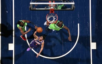 MINNEAPOLIS, MN -  NOVEMBER 23: Devin Booker #1 of the Phoenix Suns shoots the ball against the Minnesota Timberwolves on November 23, 2019 at Target Center in Minneapolis, Minnesota. NOTE TO USER: User expressly acknowledges and agrees that, by downloading and or using this Photograph, user is consenting to the terms and conditions of the Getty Images License Agreement. Mandatory Copyright Notice: Copyright 2019 NBAE (Photo by David Sherman/NBAE via Getty Images)
