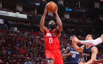 HOUSTON, TX - NOVEMBER 24 : James Harden #13 of the Houston Rockets drives to the basket during a game against the Dallas Mavericks on November 24, 2019 at the Toyota Center in Houston, Texas. NOTE TO USER: User expressly acknowledges and agrees that, by downloading and or using this photograph, User is consenting to the terms and conditions of the Getty Images License Agreement. Mandatory Copyright Notice: Copyright 2019 NBAE (Photo by Bill Baptist/NBAE via Getty Images)