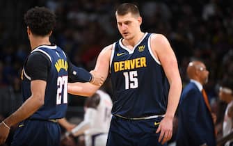 DENVER, CO - NOVEMBER 24: Jamal Murray #27 and Nikola Jokic #15 of the Denver Nuggets hi-five during a game against the Phoenix Suns on November 24, 2019 at the Pepsi Center in Denver, Colorado. NOTE TO USER: User expressly acknowledges and agrees that, by downloading and/or using this Photograph, user is consenting to the terms and conditions of the Getty Images License Agreement. Mandatory Copyright Notice: Copyright 2019 NBAE (Photo by Garrett Ellwood/NBAE via Getty Images)