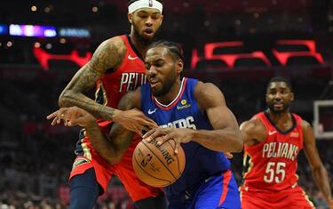 LOS ANGELES, CA - NOVEMBER 24: Brandon Ingram #14 of the New Orleans Pelicans guard Kawhi Leonard #2 of the Los Angeles Clippers as he drives to the basket in the second half of the game against the New Orleans Pelicans at Staples Center on November 24, 2019 in Los Angeles, California. NOTE TO USER: User expressly acknowledges and agrees that, by downloading and/or using this Photograph, user is consenting to the terms and conditions of the Getty Images License Agreement. (Photo by Jayne Kamin-Oncea/Getty Images)