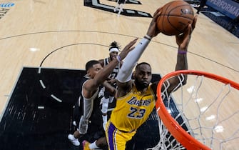 SAN ANTONIO, TX - NOVEMBER 25: LeBron James #23 of the Los Angeles Lakers dunks the ball against the San Antonio Spurs on November 25, 2019 at the AT&T Center in San Antonio, Texas. NOTE TO USER: User expressly acknowledges and agrees that, by downloading and or using this photograph, user is consenting to the terms and conditions of the Getty Images License Agreement. Mandatory Copyright Notice: Copyright 2019 NBAE (Photos by Logan Riely/NBAE via Getty Images)