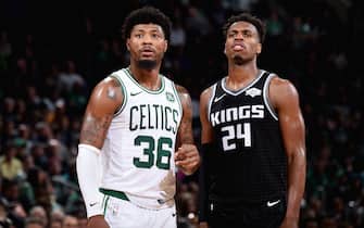 BOSTON, MA - NOVEMBER 25: Marcus Smart #36 of the Boston Celtics and Buddy Hield #24 of the Sacramento Kings looks on during the game on November 25, 2019 at the TD Garden in Boston, Massachusetts.  NOTE TO USER: User expressly acknowledges and agrees that, by downloading and or using this photograph, User is consenting to the terms and conditions of the Getty Images License Agreement. Mandatory Copyright Notice: Copyright 2019 NBAE  (Photo by Brian Babineau/NBAE via Getty Images)
