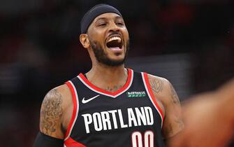 CHICAGO, ILLINOIS - NOVEMBER 25: Carmelo Anthony #00 of the Portland Trail Blazers yells after a dunk against the Chicago Bulls at the United Center on November 25, 2019 in Chicago, Illinois. The Trailblazers defeated the Bulls 117-94. NOTE TO USER: User expressly acknowledges and agrees that, by downloading and or using this photograph, User is consenting to the terms and conditions of the Getty Images License Agreement. (Photo by Jonathan Daniel/Getty Images)
