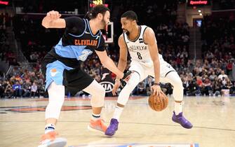 CLEVELAND, OHIO - NOVEMBER 25: Spencer Dinwiddie #8 of the Brooklyn Nets tries to drive around Larry Nance Jr. #22 of the Cleveland Cavaliers during the second half at Rocket Mortgage Fieldhouse on November 25, 2019 in Cleveland, Ohio. The Nets defeated the Cavaliers 108-106. NOTE TO USER: User expressly acknowledges and agrees that, by downloading and/or using this photograph, user is consenting to the terms and conditions of the Getty Images License Agreement. (Photo by Jason Miller/Getty Images)