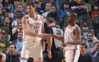 OKLAHOMA CITY, OK- NOVEMBER 25: Danilo Gallinari #8 and Chris Paul #3 of the Oklahoma City Thunder hi-five during a game against the Golden State Warriors on November 25, 2019 at Chesapeake Energy Arena in Oklahoma City, Oklahoma. NOTE TO USER: User expressly acknowledges and agrees that, by downloading and or using this photograph, User is consenting to the terms and conditions of the Getty Images License Agreement. Mandatory Copyright Notice: Copyright 2019 NBAE (Photo by Noah Graham/NBAE via Getty Images)