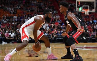 MIAMI, FLORIDA - NOVEMBER 03: James Harden #13 of the Houston Rockets dribbles against Jimmy Butler #22 of the Miami Heat in the first half at American Airlines Arena on November 03, 2019 in Miami, Florida. NOTE TO USER: User expressly acknowledges and agrees that, by downloading and or using this photograph, User is consenting to the terms and conditions of the Getty Images License Agreement. (Photo by Mark Brown/Getty Images)