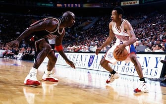 PHILADELPHIA - 1997:  Allen Iverson #3 of the Philadelphia 76ers faces off at the perimeter against Michael Jordan #23 of the Chicago Bulls at the First Union Center during the 1997 NBA season in Philadelphia, Pennsylvania.  NOTE TO USER: User expressly acknowledges and agrees that, by downloading and/or using this Photograph, User is consenting to the terms and conditions of the Getty Images License Agreement  Mandatory Copyright Notice:  Copyright 1997 NBAE  (Photo by Lou Capozzola/NBAE via Getty Images)