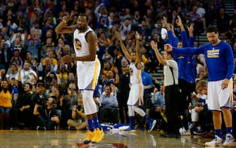 OAKLAND, CA - NOVEMBER 03: Kevin Durant #35 of the Golden State Warriors celebrates a basket against the Oklahoma City Thunder at ORACLE Arena on November 3, 2016 in Oakland, California. NOTE TO USER: User expressly acknowledges and agrees that, by downloading and or using this photograph, user is consenting to the terms and conditions of Getty Images License Agreement. (Photo by Lachlan Cunningham/Getty Images)
