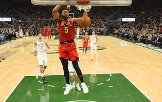 MILWAUKEE, WISCONSIN - NOVEMBER 27:  Jabari Parker #5 of the Atlanta Hawks dunks against the Milwaukee Bucks during the first half of a game at Fiserv Forum on November 27, 2019 in Milwaukee, Wisconsin. NOTE TO USER: User expressly acknowledges and agrees that, by downloading and or using this photograph, User is consenting to the terms and conditions of the Getty Images License Agreement. (Photo by Stacy Revere/Getty Images)