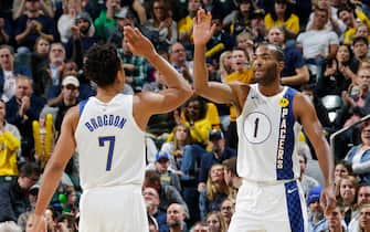 INDIANAPOLIS, IN - NOVEMBER 27: T.J. Warren #1 of the Indiana Pacers and Malcolm Brogdon #7 of the Indiana Pacers celebrate during the game against the Utah Jazz on November 27, 2019 at Bankers Life Fieldhouse in Indianapolis, Indiana. NOTE TO USER: User expressly acknowledges and agrees that, by downloading and or using this Photograph, user is consenting to the terms and conditions of the Getty Images License Agreement. Mandatory Copyright Notice: Copyright 2019 NBAE (Photo by Ron Hoskins/NBAE via Getty Images)