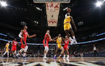 NEW ORLEANS, LA - NOVEMBER 27: LeBron James #23 of the Los Angeles Lakers dunks the ball against the New Orleans Pelicans on November 27, 2019 at the Smoothie King Center in New Orleans, Louisiana. NOTE TO USER: User expressly acknowledges and agrees that, by downloading and or using this Photograph, user is consenting to the terms and conditions of the Getty Images License Agreement. Mandatory Copyright Notice: Copyright 2019 NBAE (Photo by Layne Murdoch Jr./NBAE via Getty Images)
