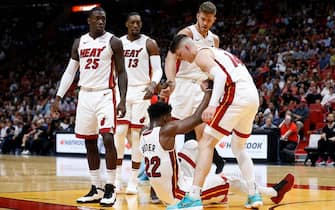 MIAMI, FLORIDA - OCTOBER 29: Tyler Herro #14 and Meyers Leonard #0 of the Miami Heat help Jimmy Butler #22 up against the Atlanta Hawks during the first half at American Airlines Arena on October 29, 2019 in Miami, Florida. NOTE TO USER: User expressly acknowledges and agrees that, by downloading and/or using this photograph, user is consenting to the terms and conditions of the Getty Images License Agreement. (Photo by Michael Reaves/Getty Images)