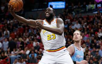 MIAMI, FLORIDA - NOVEMBER 29:  Draymond Green #23 of the Golden State Warriors attempts a layup against the Miami Heat during the first half at American Airlines Arena on November 29, 2019 in Miami, Florida. NOTE TO USER: User expressly acknowledges and agrees that, by downloading and/or using this photograph, user is consenting to the terms and conditions of the Getty Images License Agreement. (Photo by Michael Reaves/Getty Images)