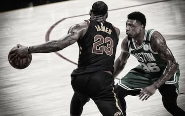 CLEVELAND, OH - MAY 21:  (EDITOR'S NOTE: Image has been digitally enhanced.) Marcus Smart #36 of the Boston Celtics plays defense against LeBron James #23 of the Cleveland Cavaliers in Game Four of the Eastern Conference Finals of the 2018 NBA Playoffs on May 21, 2018 at Quicken Loans Arena in Cleveland, Ohio. NOTE TO USER: User expressly acknowledges and agrees that, by downloading and or using this Photograph, user is consenting to the terms and conditions of the Getty Images License Agreement. Mandatory Copyright Notice: Copyright 2018 NBAE (Photo by Brian Babineau/NBAE via Getty Images)