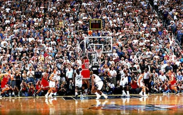 SALT LAKE CITY - JUNE 14:  Michael Jordan #23 of the Chicago Bulls shoots the game-winning jumpshot over Byron Russell #3 of the Utah Jazz during Game Six of the 1998 NBA Finals on June 14, 1998 at the Delta Center in Salt Lake City, Utah. The Bulls defeated the Jazz 87-86.  NOTE TO USER: User expressly acknowledges and agrees that, by downloading and or using this Photograph, user is consenting to the terms and conditions of the Getty Images License Agreement.  Mandatory Copyright Notice: Copyright 1998 NBAE (Photo by Fernando Medina/NBAE via Getty Images)