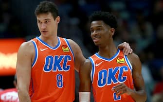 NEW ORLEANS, LOUISIANA - DECEMBER 01: Nerlens Noel #9 of the Oklahoma City Thunderand Shai Gilgeous-Alexander #2 of the Oklahoma City Thunderstand on the court during a NBA game against the New Orleans Pelicans at Smoothie King Center on December 01, 2019 in New Orleans, Louisiana. NOTE TO USER: User expressly acknowledges and agrees that, by downloading and or using this photograph, User is consenting to the terms and conditions of the Getty Images License Agreement. (Photo by Sean Gardner/Getty Images)