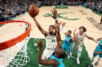 MILWAUKEE, WI - NOVEMBER 30: Giannis Antetokounmpo #34 of the Milwaukee Bucks drives to the basket during a game against the Charlotte Hornets on November 30, 2019 at the Fiserv Forum Center in Milwaukee, Wisconsin. NOTE TO USER: User expressly acknowledges and agrees that, by downloading and or using this Photograph, user is consenting to the terms and conditions of the Getty Images License Agreement. Mandatory Copyright Notice: Copyright 2019 NBAE (Photo by Gary Dineen/NBAE via Getty Images).