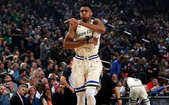 MILWAUKEE, WI - DECEMBER 2: Giannis Antetokounmpo #34 of the Milwaukee Bucks reacts to a play against the New York Knicks on December 2, 2019 at the Fiserv Forum Center in Milwaukee, Wisconsin. NOTE TO USER: User expressly acknowledges and agrees that, by downloading and or using this Photograph, user is consenting to the terms and conditions of the Getty Images License Agreement. Mandatory Copyright Notice: Copyright 2019 NBAE (Photo by Gary Dineen/NBAE via Getty Images).