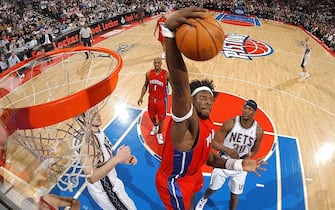 AUBURN HILLS, MI - FEBRUARY 14:  Ben Wallace #3 of the Detroit Pistons rebounds against Clifford Robinson #30 of the New Jersey Nets on February 14, 2006 at the Palace of Auburn Hills in Auburn Hills, Michigan.  NOTE TO USER: User expressly acknowledges and agrees that, by downloading and/or using this photograph, User is consenting to the terms and conditions of the Getty Images License Agreement.  Mandatory Copyright Notice: Copyright 2006 NBAE  (Photo by Allen Einstein/NBAE via Getty Images)