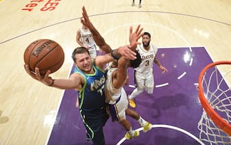 1186286228 LOS ANGELES, CA - DECEMBER 1: Luka Doncic #77 of the Dallas Mavericks drives to the basket against the Los Angeles Lakers on December 1, 2019 at STAPLES Center in Los Angeles, California. NOTE TO USER: User expressly acknowledges and agrees that, by downloading and/or using this Photograph, user is consenting to the terms and conditions of the Getty Images License Agreement. Mandatory Copyright Notice: Copyright 2019 NBAE (Photo by Andrew D. Bernstein/NBAE via Getty Images)