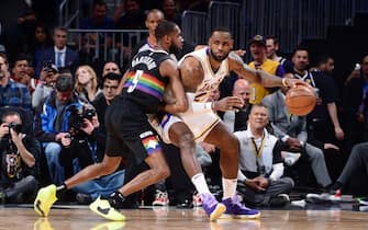 1186308496 DENVER, CO - DECEMBER 3: LeBron James #23 of the Los Angeles Lakers handles the ball during the game against the Denver Nuggets on December 3, 2019 at the Pepsi Center in Denver, Colorado. NOTE TO USER: User expressly acknowledges and agrees that, by downloading and/or using this Photograph, user is consenting to the terms and conditions of the Getty Images License Agreement. Mandatory Copyright Notice: Copyright 2019 NBAE (Photo by Bart Young/NBAE via Getty Images)