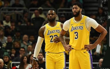 MILWAUKEE, WISCONSIN - DECEMBER 19: LeBron James #23 and Anthony Davis #3 of the Los Angeles Lakers wait for a free throw during the second half of a game against the Milwaukee Bucks at Fiserv Forum on December 19, 2019 in Milwaukee, Wisconsin. NOTE TO USER: User expressly acknowledges and agrees that, by downloading and or using this photograph, User is consenting to the terms and conditions of the Getty Images License Agreement. (Photo by Stacy Revere/Getty Images)