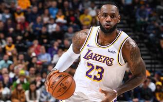 SALT LAKE CITY, UT - DECEMBER 4: LeBron James #23 of the Los Angeles Lakers handles the ball against the Utah Jazz on December 4, 2019 at vivint.SmartHome Arena in Salt Lake City, Utah. NOTE TO USER: User expressly acknowledges and agrees that, by downloading and or using this Photograph, User is consenting to the terms and conditions of the Getty Images License Agreement. Mandatory Copyright Notice: Copyright 2019 NBAE (Photo by Garrett Ellwood/NBAE via Getty Images)