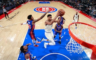 1186534187 DETROIT, MI - DECEMBER 4: Giannis Antetokounmpo #34 of the Milwaukee Bucks attacks the basket during the game against the Detroit Pistons on December 4, 2019 at Little Caesars Arena in Detroit, Michigan. NOTE TO USER: User expressly acknowledges and agrees that, by downloading and/or using this photograph, User is consenting to the terms and conditions of the Getty Images License Agreement. Mandatory Copyright Notice: Copyright 2019 NBAE (Photo by Brian Sevald/NBAE via Getty Images)