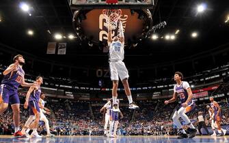 1186528068 ORLANDO, FL - DECEMBER 4: Aaron Gordon #00 of the Orlando Magic dunks the ball against the Phoenix Suns on December 4, 2019 at Amway Center in Orlando, Florida. NOTE TO USER: User expressly acknowledges and agrees that, by downloading and or using this photograph, User is consenting to the terms and conditions of the Getty Images License Agreement. Mandatory Copyright Notice: Copyright 2019 NBAE (Photo by Fernando Medina/NBAE via Getty Images)