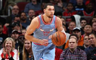 1186511188 CHICAGO, IL - DECEMBER 4: Zach LaVine #8 of the Chicago Bulls handles the ball during the game against the Memphis Grizzlies on December 4, 2019 at the United Center in Chicago, Illinois. NOTE TO USER: User expressly acknowledges and agrees that, by downloading and or using this photograph, user is consenting to the terms and conditions of the Getty Images License Agreement. Mandatory Copyright Notice: Copyright 2019 NBAE (Photo by Gary Dineen/NBAE via Getty Images)