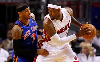 MIAMI, FL - APRIL 30:  LeBron James #6 of the Miami Heat posts up Carmelo Anthony #7 of the New York Knicks during Game Two of the Eastern Conference Quarterfinals in the 2012 NBA Playoffs  at American Airlines Arena on April 30, 2012 in Miami, Florida. NOTE TO USER: User expressly acknowledges and agrees that, by downloading and/or using this Photograph, User is consenting to the terms and conditions of the Getty Images License Agreement.  (Photo by Mike Ehrmann/Getty Images)