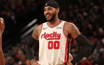 PORTLAND, OR - NOVEMBER 29: Carmelo Anthony #00 of the Portland Trail Blazers smiles during the game against the Chicago Bulls on November 29, 2019 at the Moda Center in Portland, Oregon. NOTE TO USER: User expressly acknowledges and agrees that, by downloading and or using this Photograph, user is consenting to the terms and conditions of the Getty Images License Agreement. Mandatory Copyright Notice: Copyright 2019 NBAE (Photo by Cameron Browne/NBAE via Getty Images)