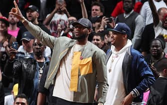 BROOKLYN, NY - APRIL 10: LeBron James #23 of the Los Angeles Lakers and Carmelo Anthony react during the game between the Miami Heat and Brooklyn Nets on April 10, 2019 at Barclays Center in Brooklyn, New York. NOTE TO USER: User expressly acknowledges and agrees that, by downloading and or using this Photograph, user is consenting to the terms and conditions of the Getty Images License Agreement. Mandatory Copyright Notice: Copyright 2019 NBAE (Photo by Nathaniel S. Butler/NBAE via Getty Images)