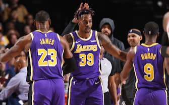1186800704 PORTLAND, OR - DECEMBER 6: Dwight Howard #39 of the Los Angeles Lakers high-fives his teammates during a game against the Portland Trail Blazers on December 6, 2019 at the Moda Center Arena in Portland, Oregon. NOTE TO USER: User expressly acknowledges and agrees that, by downloading and or using this photograph, user is consenting to the terms and conditions of the Getty Images License Agreement. Mandatory Copyright Notice: Copyright 2019 NBAE (Photo by Sam Forencich/NBAE via Getty Images)