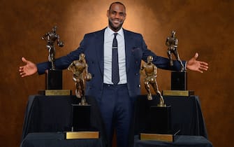 MIAMI, FL - MAY 5: LeBron James #6 of the Miami Heat poses with his collection of Maurice Podoloff Trophies after being named the 2012-2013 Kia NBA Most Valuable Player (MVP) of the Year for the fourth time on May 5, 2013 at American Airlines Arena in Miami, Florida. NOTE TO USER: User expressly acknowledges and agrees that, by downloading and or using this photograph, User is consenting to the terms and conditions of the Getty Images License Agreement. Mandatory Copyright Notice: Copyright 2013 NBAE (Photo by Jesse D. Garrabrant/NBAE via Getty Images)