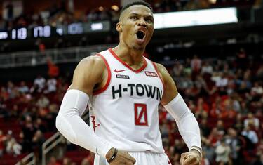HOUSTON, TX - DECEMBER 07:  Russell Westbrook #0 of the Houston Rockets reacts after a basket in the fourth quarter against the Phoenix Suns at Toyota Center on December 7, 2019 in Houston, Texas.  NOTE TO USER: User expressly acknowledges and agrees that, by downloading and or using this photograph, User is consenting to the terms and conditions of the Getty Images License Agreement.  (Photo by Tim Warner/Getty Images)